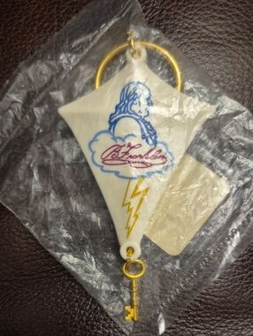 Collectible TFI Store Kite Keychain with Blue & Gold Detail